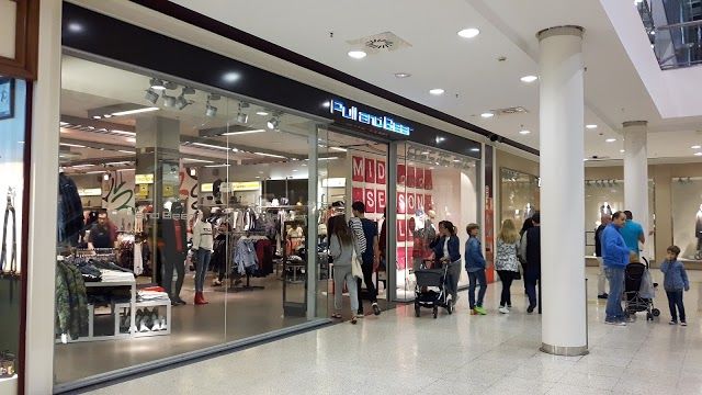 C. Comercial Alzamora